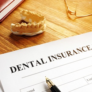 A closeup of a dental insurance plan form