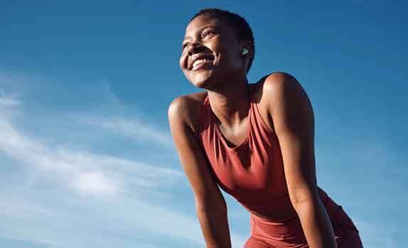 Lady smiles outdoors