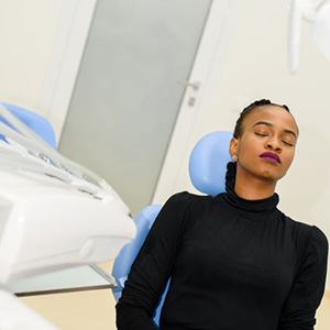 Relaxed dental patient with closed eyes