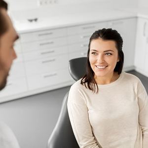 Dentist and patient talking during consultation